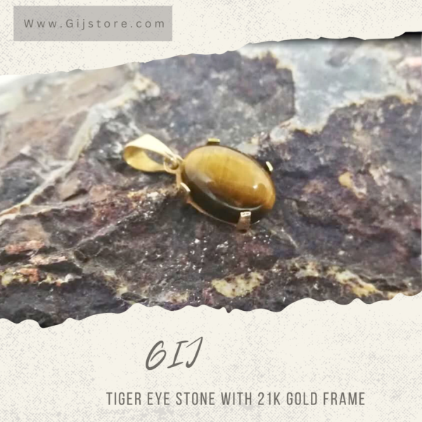 تعليقة من حجر عين النمر مع اطار ذهب عيار 21 Tiger eye
